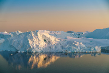 Obraz na płótnie Canvas Icebergs on Arctic Ocean in Greenland