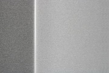 Reflection on vertical gray metallic surfaces, selective focus