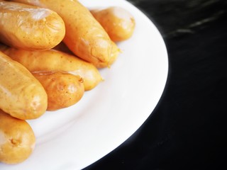 Sausage on black background