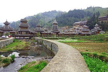 Zhaoxing Dong Zai ancient town in the morning mist, Guizhou province China. Selective and soft focus.