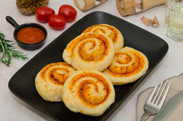 Homemade pizza rolls with mozzarella cheese. Pizza rolls