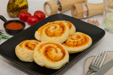 Homemade pizza rolls with mozzarella cheese. Pizza rolls
