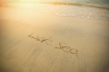 the beach sea texture text on sand beach written words Love sea on sand