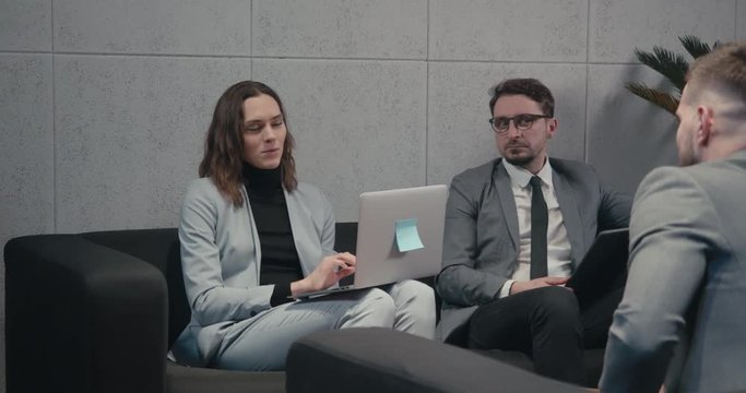 HR managers interviewing male job employee, have positive first impression of candidate, happy employers listen to applicant at interview excited of candidature. Recruitment concept. 4K UHD