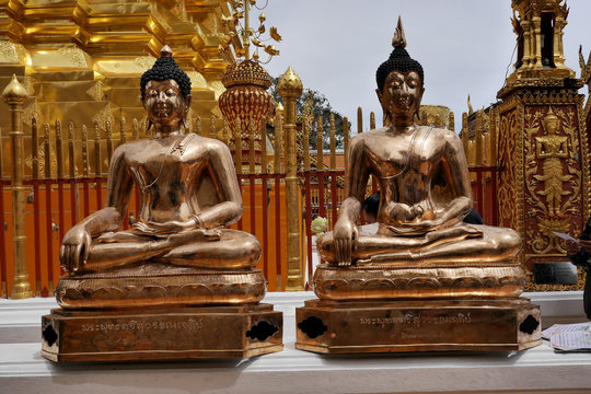 Bronze coloured Buddha statues atbWat Doi Sethep. Chiang Mai, Thailand. 