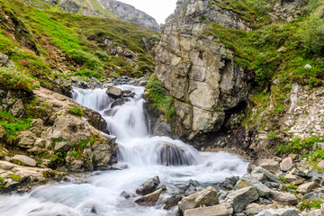 Tumbling Water down a Cascade
