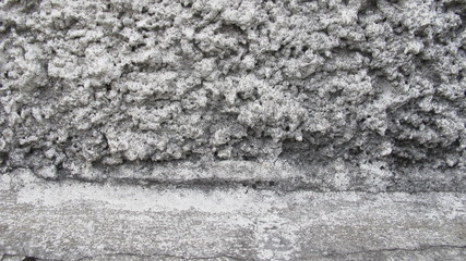 texture Walls of uneven walls of white, black, gray, Wall fence decorated in the old style.