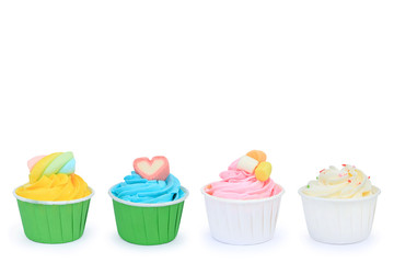 Delicious Cupcakes isolated on white background.