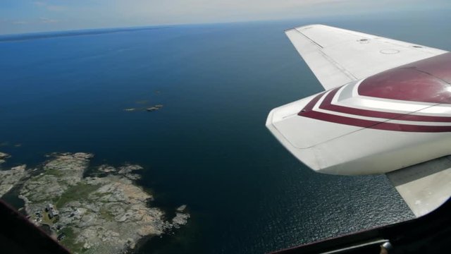 View from Inside a Small Aircraft Flying Missions Over the Gothenburg Archipelago. Scientists Record Data on Shipping Traffic and the Impact on the Oceans and Climate.