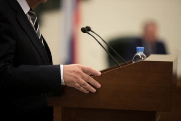 close up hand hold microphone master of ceremony annousment in event