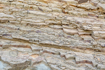 Natural sliced stone or rock texture background closeup 