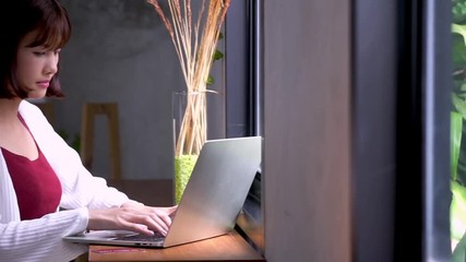 Woman using credit card for shopping online. 