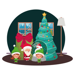 couple of elves and santa claus with christmas tree