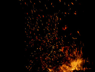 flame of fire with sparks on a black background
