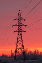 electric tower on the background of the dawn