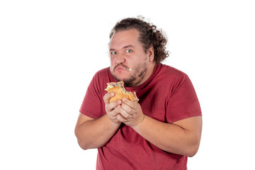 Funny fat man eating hamburger. Fast food, unhealty eat. Overweight and health problems