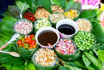 food wrapped in leaves healthy food with leaf vegetable and herbs various thai herbs ingredients