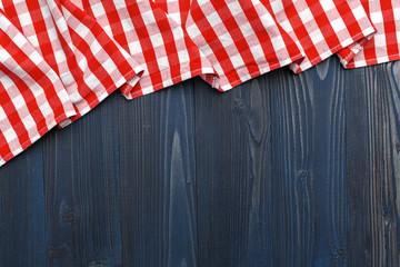 checkered tablecloth on wooden table