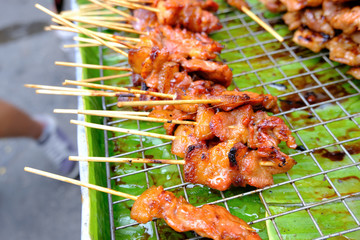 Moo Ping or Thai grilled pork skewers