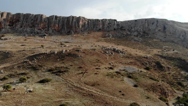 Pan Right To Left Of Huge Mountain Cill And Dry Field
