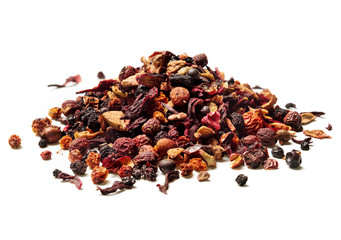 Heap of dried hibiscus petals and berries isolated on white background. Close up. High resolution.