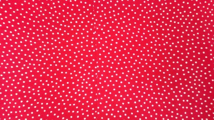 Abstract background of red surface and white spot.