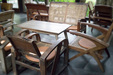 Vintage wooden furniture in loft cafe