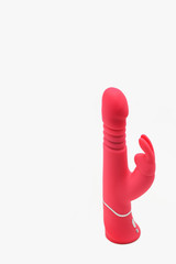 Pink sex toy for adult dildo rabbit vibrator isolated on background