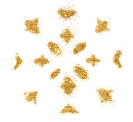 Snowflake of golden glitter sparkles on white background