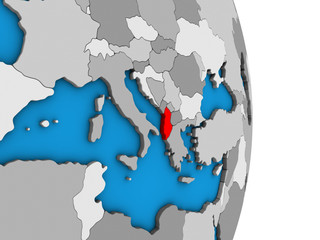 Albania on simple political 3D globe.