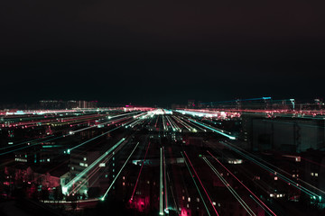 night cityscape with blurred colorful illumination