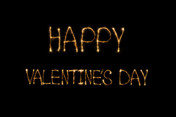 close up view of happy valentines day light lettering on black background, st valentines day concept