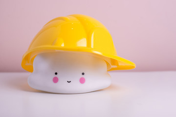 Smiling cloud in the yellow helmet