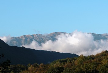 three mountains against the blue sky