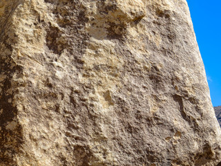 Brown and grey cliff face natural background texture