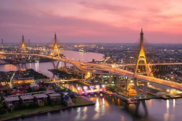 Beautiful sunset view of Bhumibol Bridge in Bangkok , Bridge of transportation for import , export , Bangkok ,Thailand