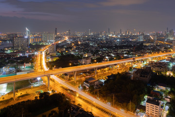 Fototapeta na wymiar Night view of highway in Bangkok City downtown cityscape urban skyline Thailand