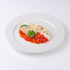 Salad with Philadelphia cheese, vegetables and parmesan. Isolated on white background.
