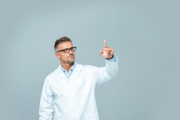 handsome scientist in white coat touching something in air isolated on white, artificial intelligence concept
