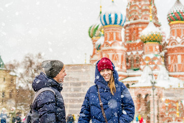 portrait of young lovers couple walking in the moscow historic city travel in europe during winter f