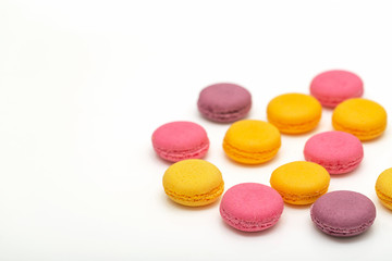 Colorful French Macaroons on the white background.