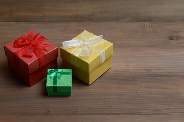 Gift boxes on wooden background