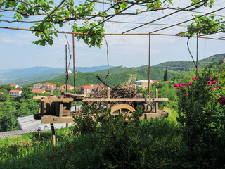 Clay pitcher and wooden wheel composition, Tbilisi, Georgia