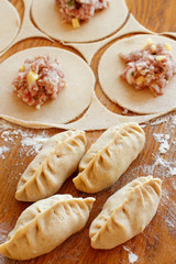 Making dumplings manti