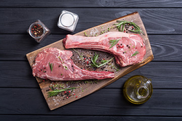 Raw beef tomahawk steak