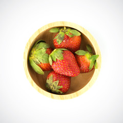 Sweet strawberry in wooden plate on a white background.