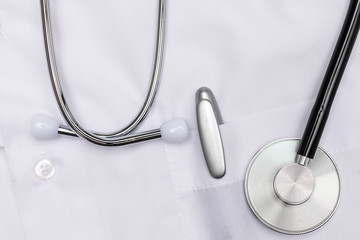 stethoscope and pen on white smock