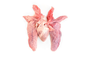 Raw pork heart and lungs isolated on white background.