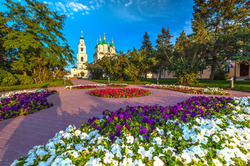 Assumption Cathedral of the Blessed Virgin Mary christian church, summer park, green trees around a...