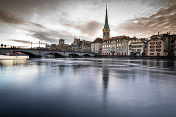Zurich, Switzerland - view of the old town with the Limmat river - obrazy, fototapety, plakaty